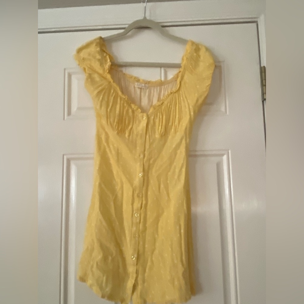 Yellow dress with white polka dots